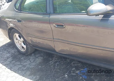 2003 Ford Taurus Ses z USA, uszkodzony, nr VIN 1FAFP55S63A137431